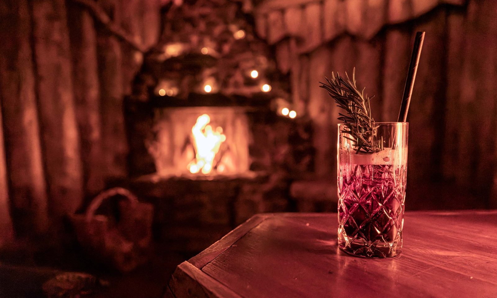 A drink in the cozy fireplace lounge of the sauna.